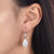 4 Carat Pear Cut Created Diamond Dangle Earrings