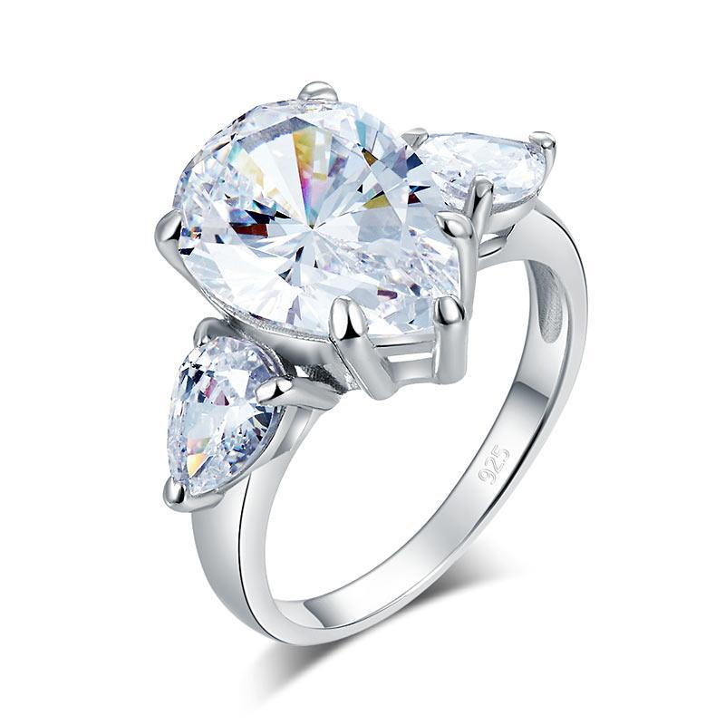 Pear Cut 4 Carat Three-Stone Ring